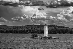 Billowing Clouds Over Loon Island Light on Lake Sunapee -BW